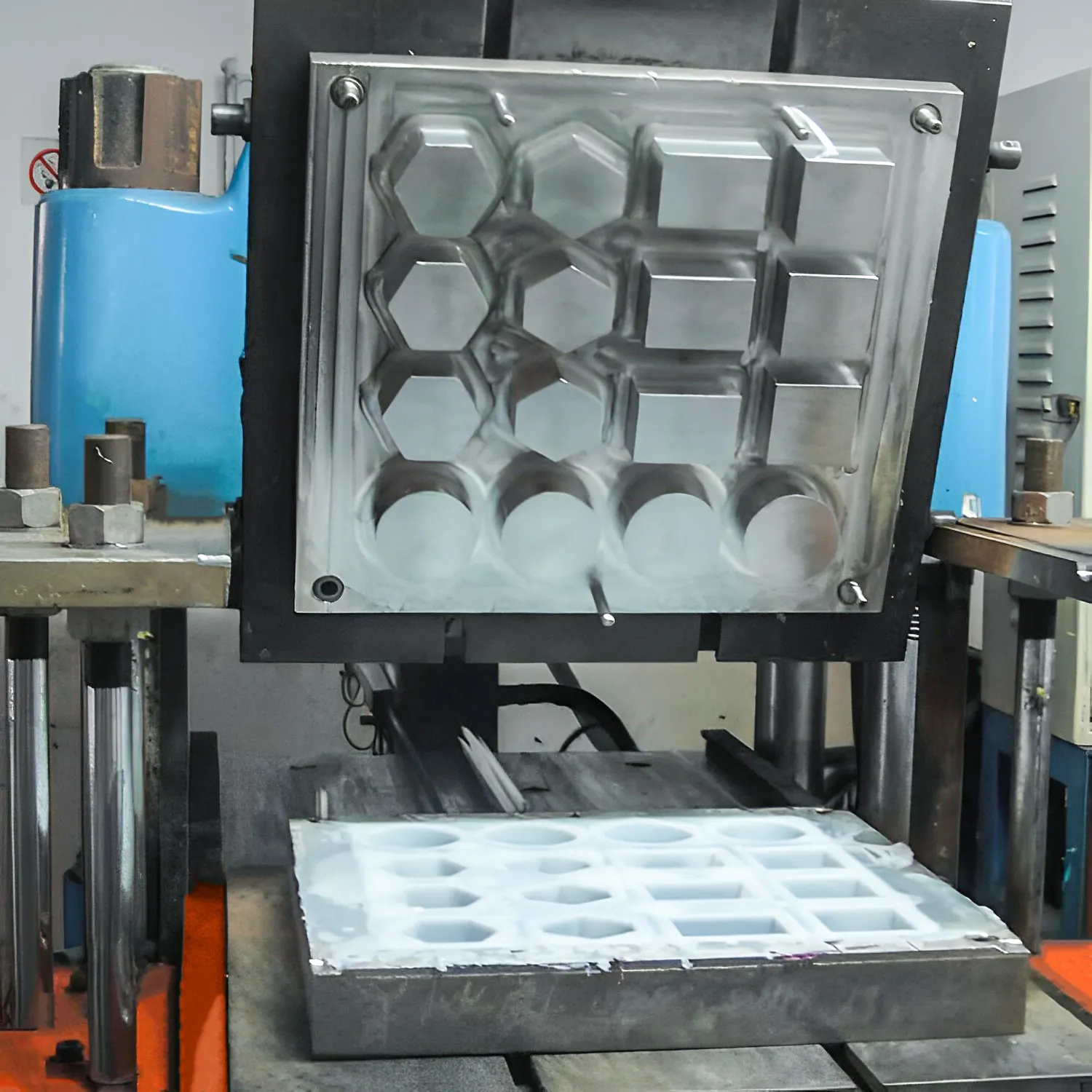 Compression mould tooling used for foam component production